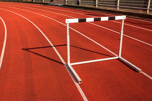 hurdle race barrier on stadium track